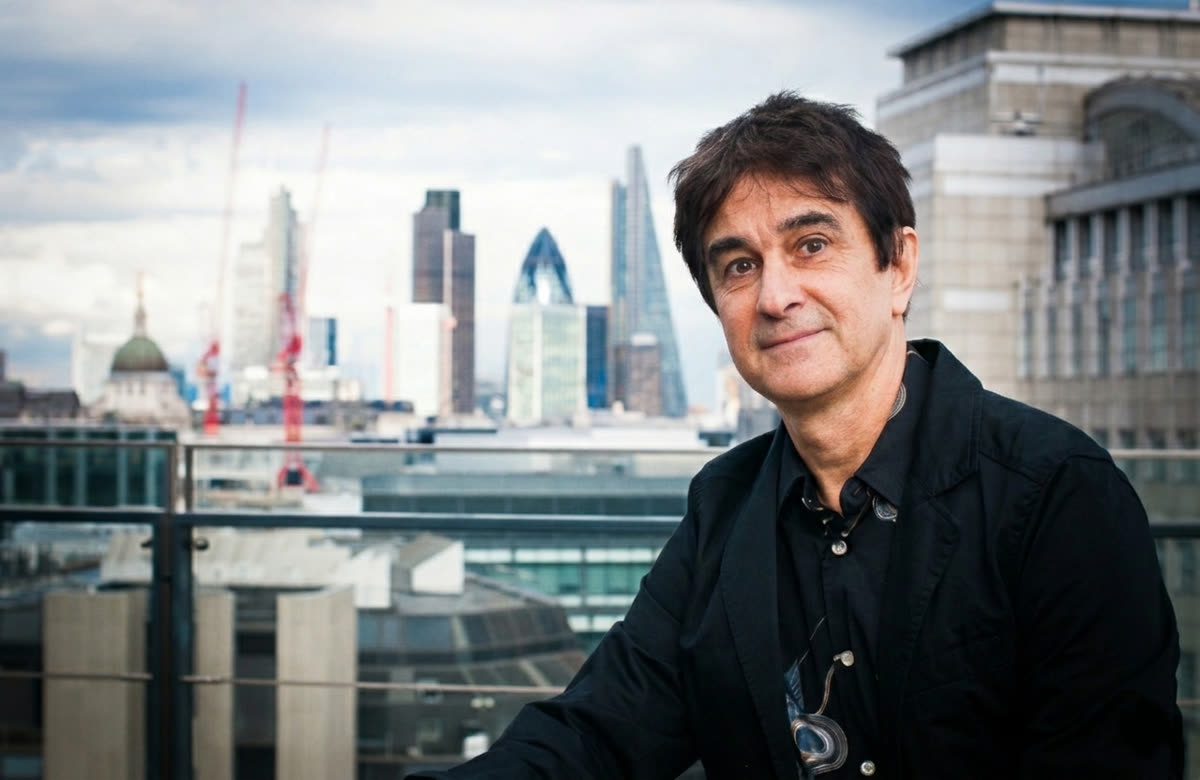 Gui Tavares with the City of London skyline behind him